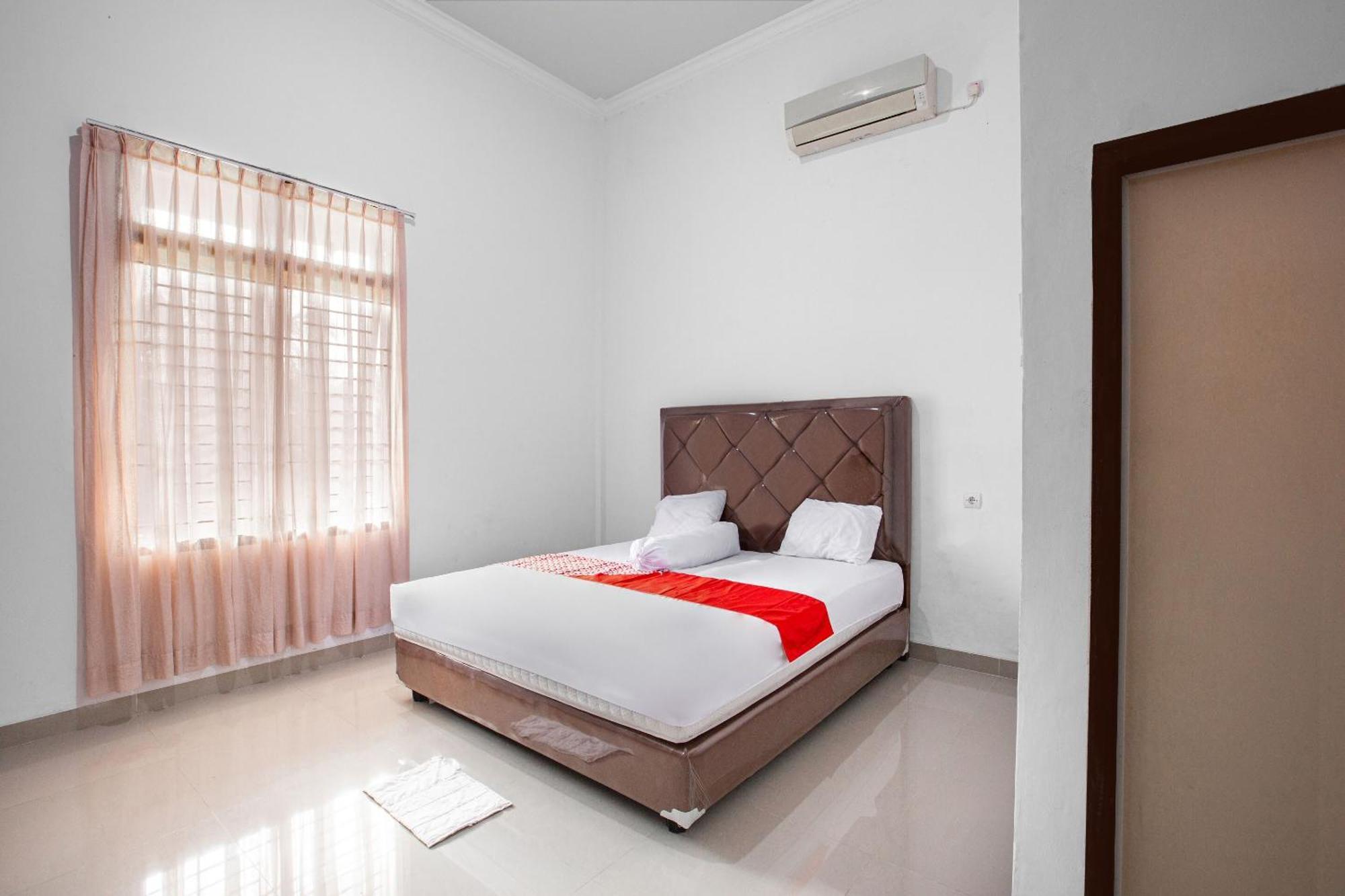 Oyo 92587 Homestay Romauli Kampung Radja Jambi Eksteriør bilde