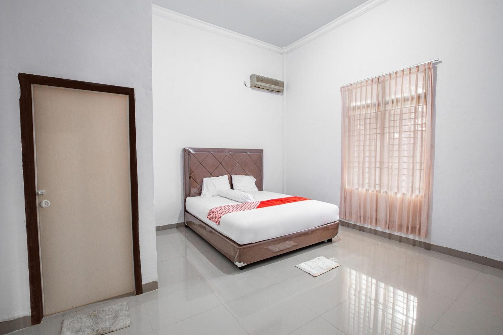 Oyo 92587 Homestay Romauli Kampung Radja Jambi Eksteriør bilde